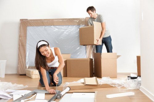 Organized storage unit in Whitecity with packed boxes and furniture